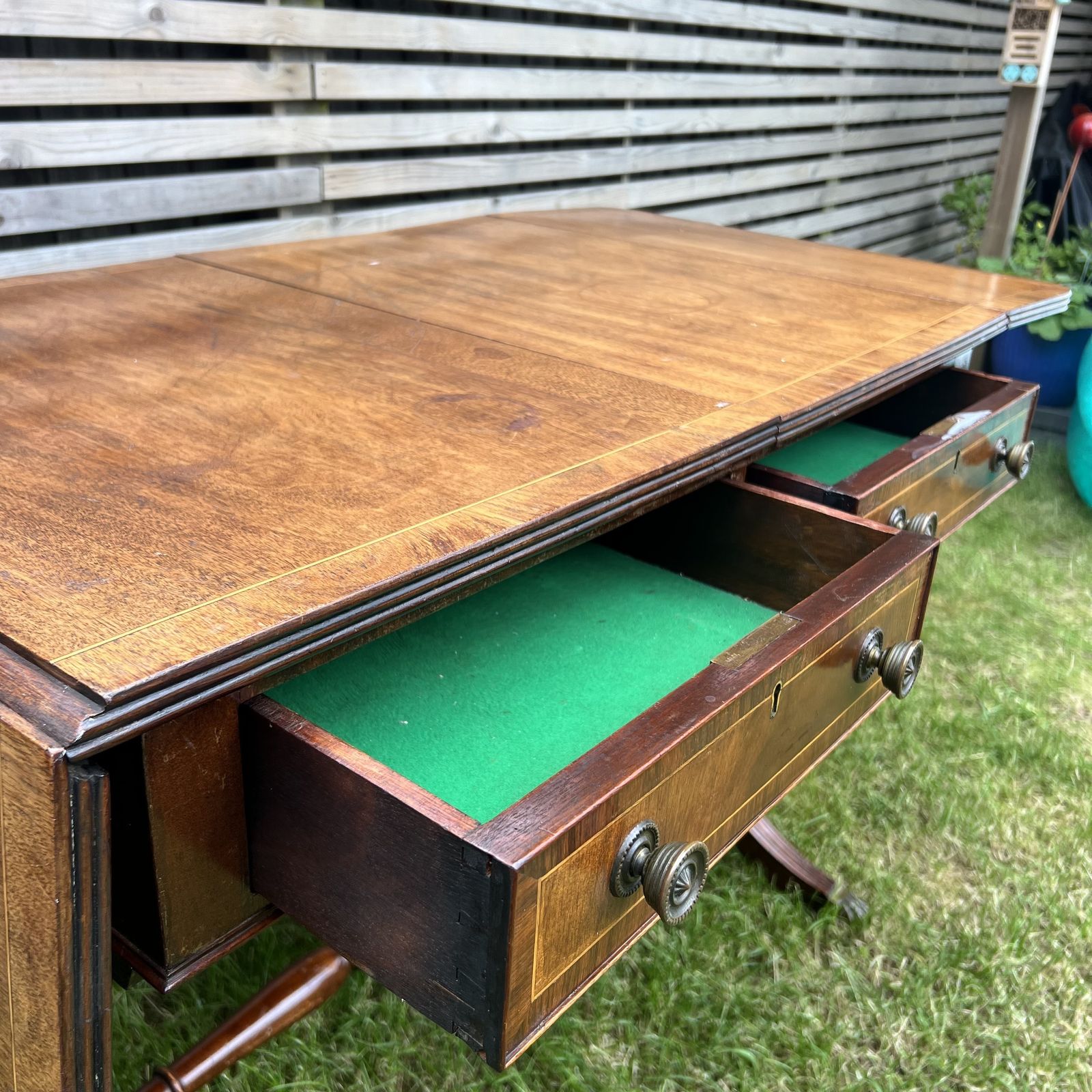 photo furniture Antique English Mahogany Drop Leaf Stretcher Table On Castors, 19th Century