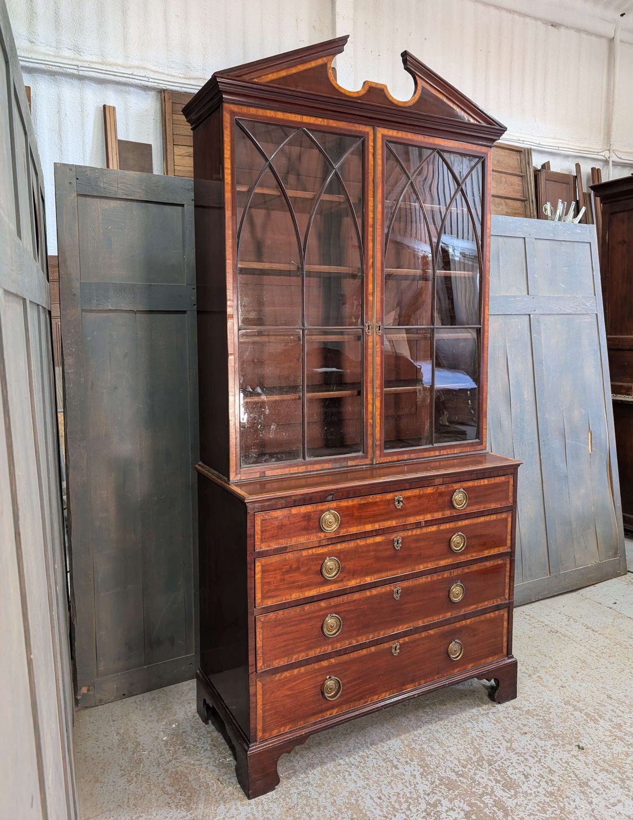 780.0 Elegant Late Georgian Glazed Satinwood Banded Mahogany Bookcase On Chest With Bracket Feet photo