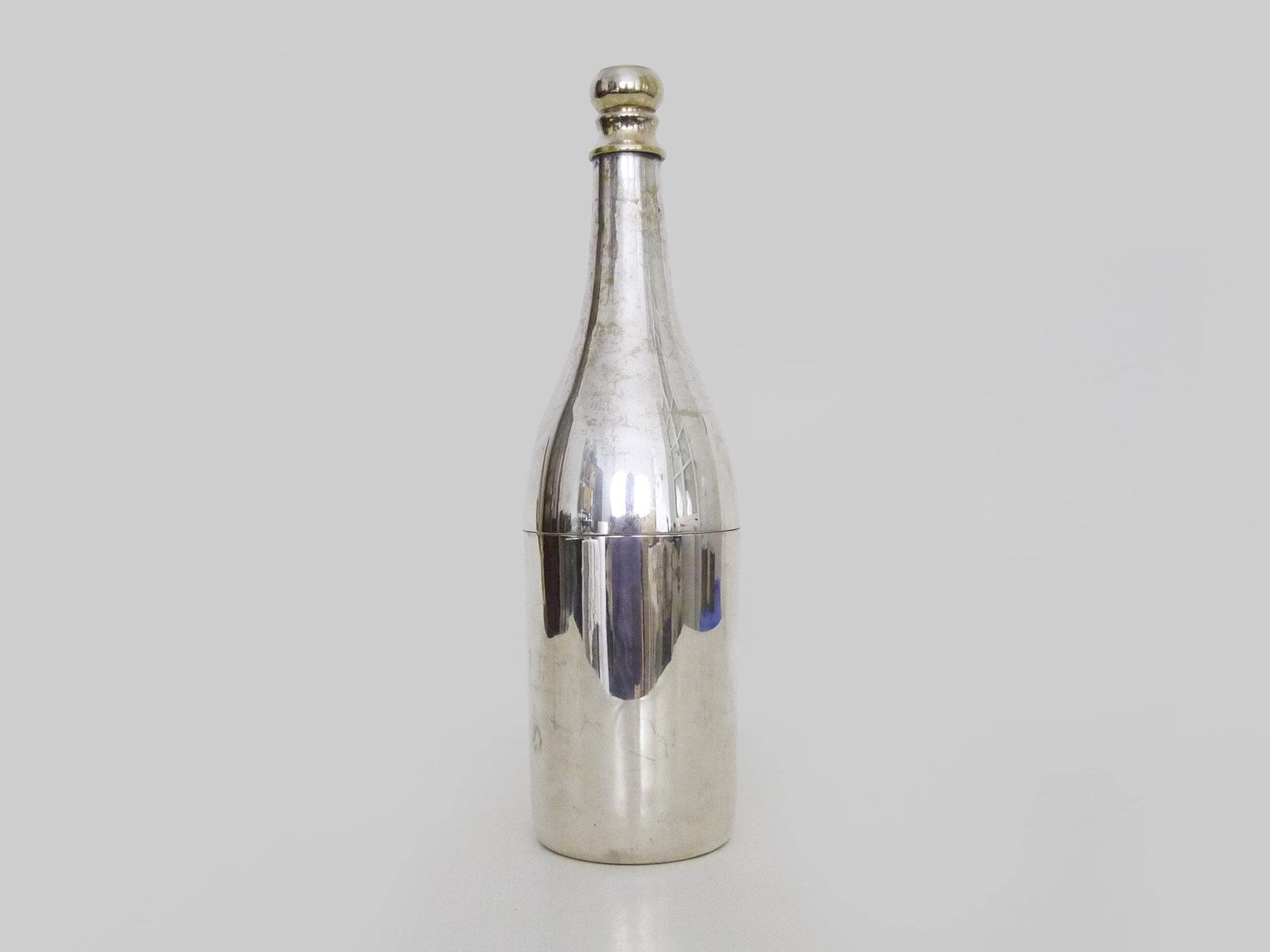 Rare Silver Metal And Brass Shaker In The Shape Of A Champagne Bottle photo furniture