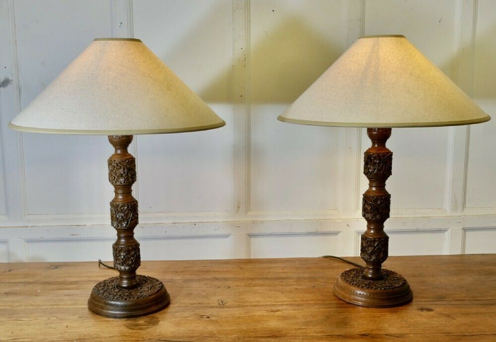 A Pair Of Teak Carved Tree Of Life Table Lamps photo furniture