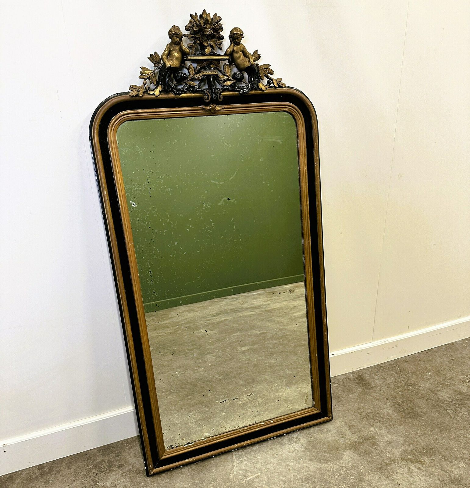Antique 1800s Black And Gold Mirror With Cupid , France 1800s. photo furniture