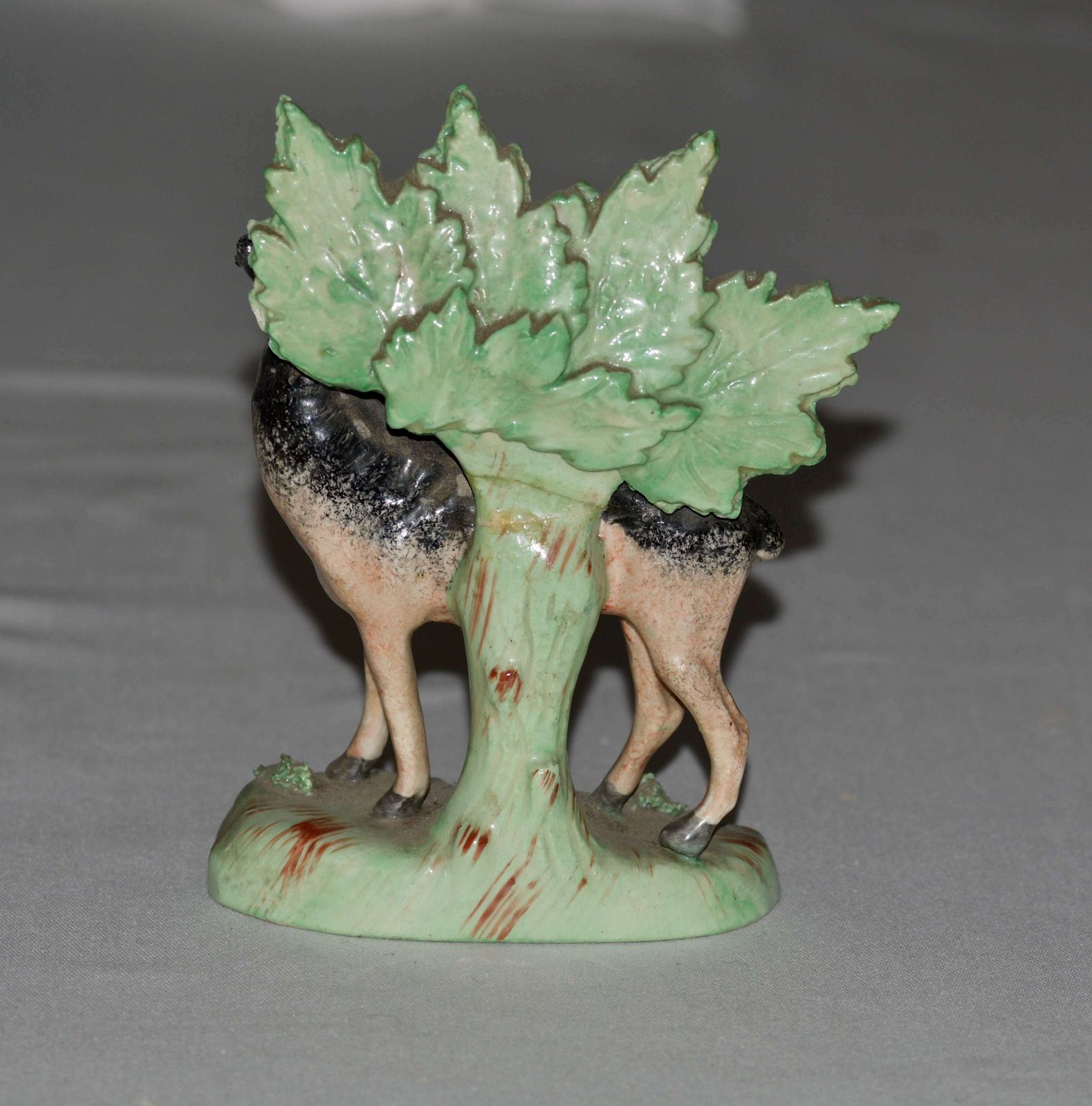 A 19th Century Staffordshire Model Of A Black And Tan Deer photo furniture