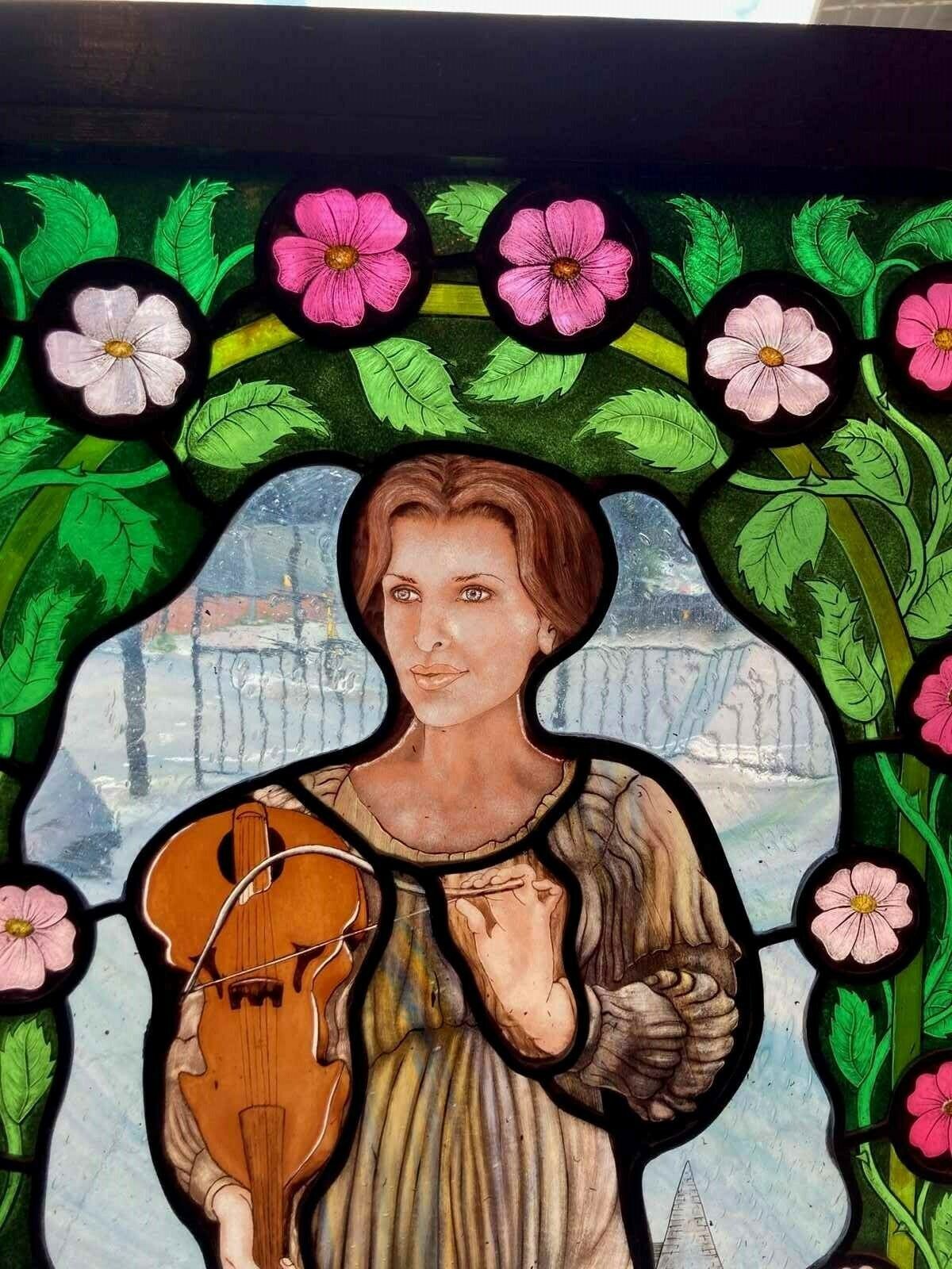 Beautiful Stained Glass Window With Violin Player photo furniture