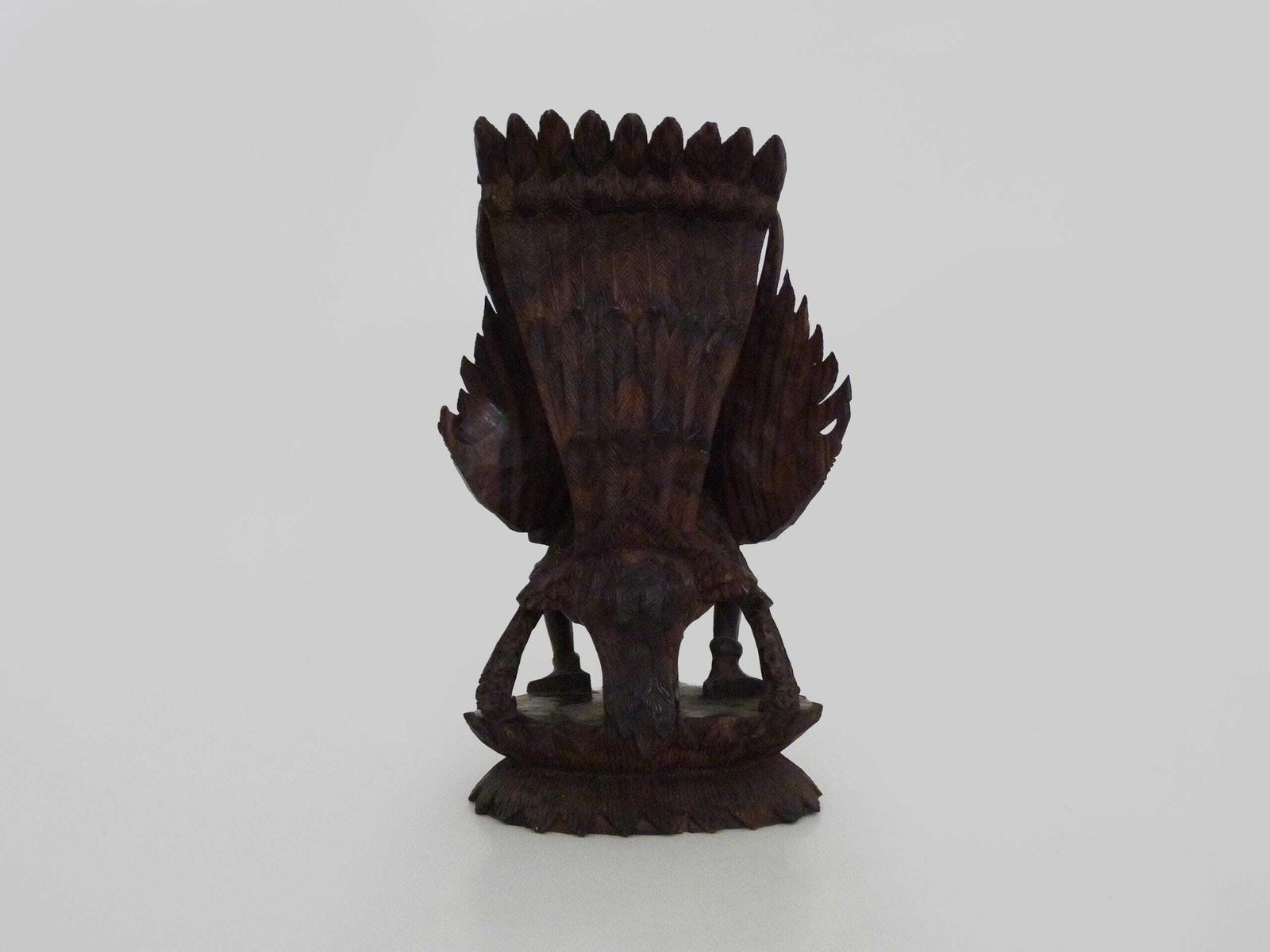 photo for sale Carved Wooden Statue Of Vishnu Riding Garuda. Bali Indonesia. 1930s