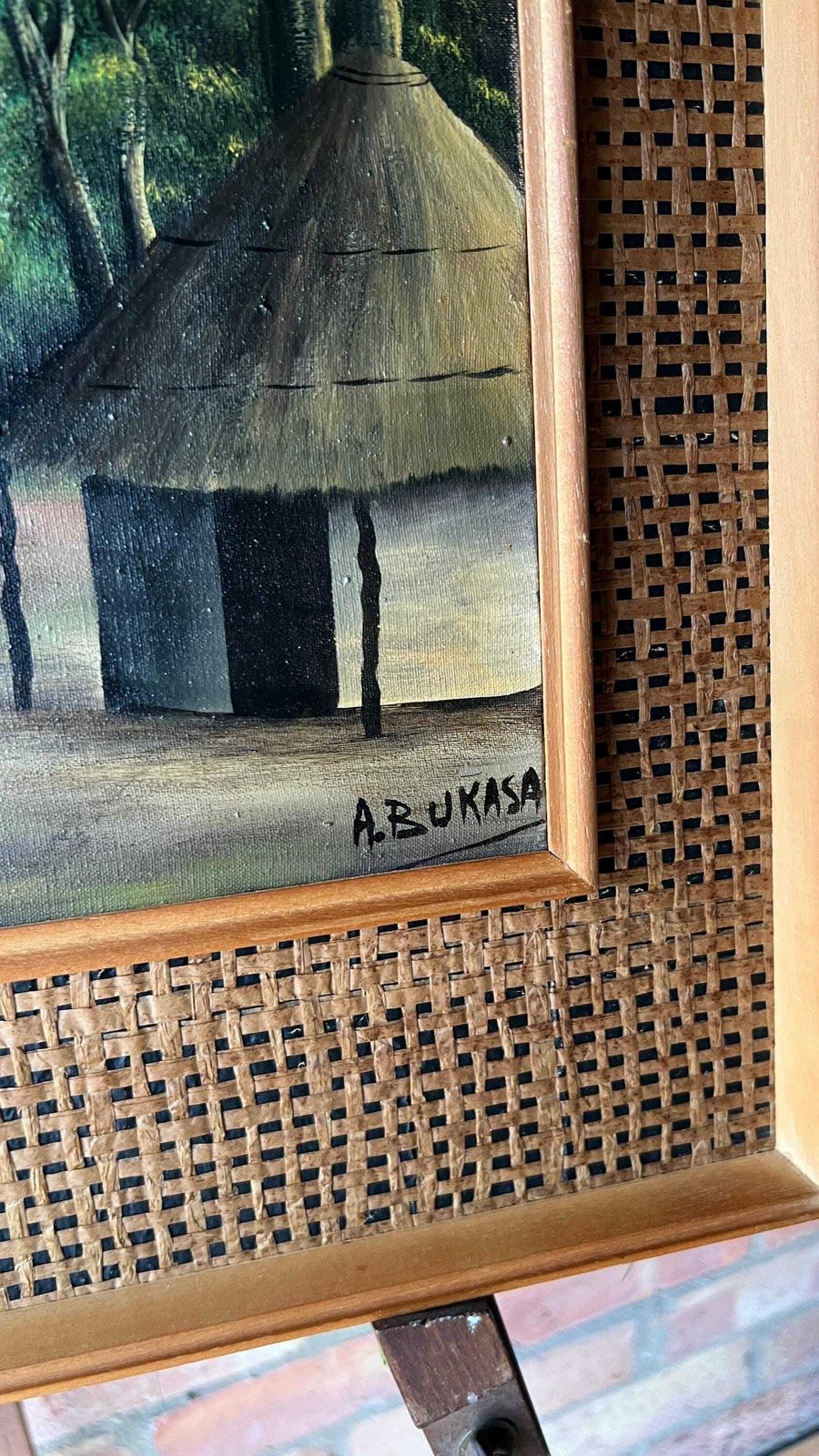 Vintage Framed Oil On Canvas Painting Depicting An African Village Scene photo for sale