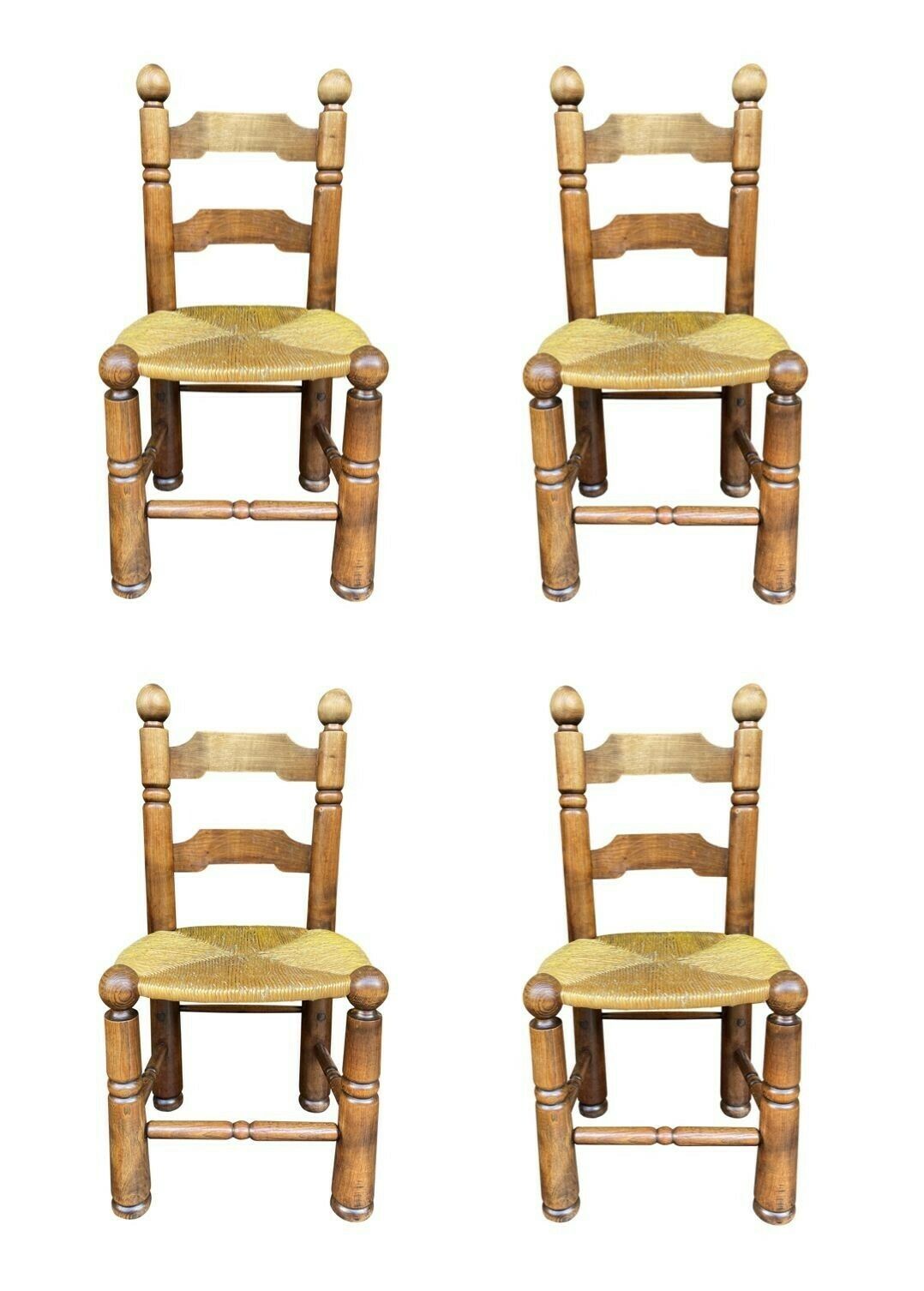 A Set Of Four 1940s Oak And Woven Rope Seat Chairs By Charles Dudouyt