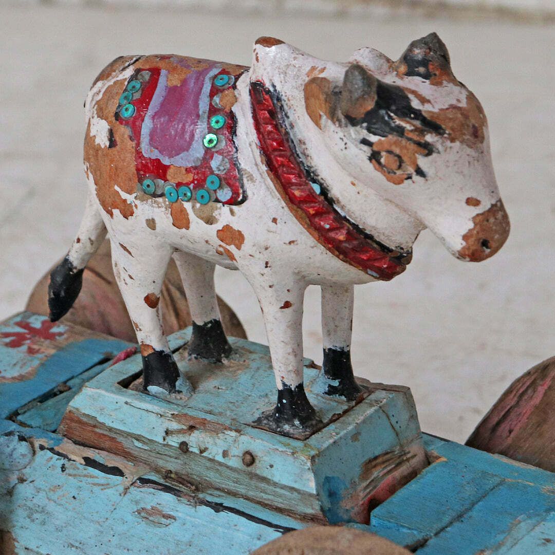 Vintage Blue And White Cow On Wheels photo furniture