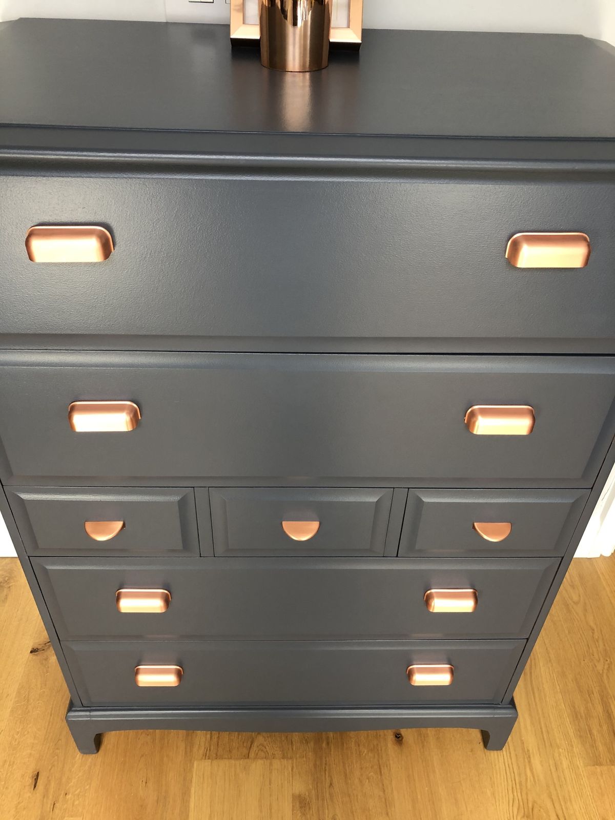 photo vintage A Pair Of Stag Minstrel Tallboy Chest Of Drawers Painted Blue With Copper Handles