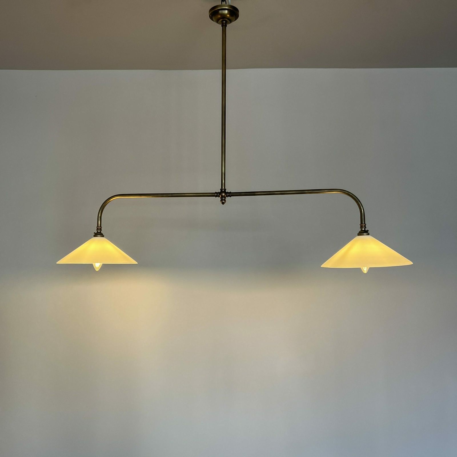 photo furniture Newly Made Antique Brushed Brass Pendant With White Conical Glass Shades
