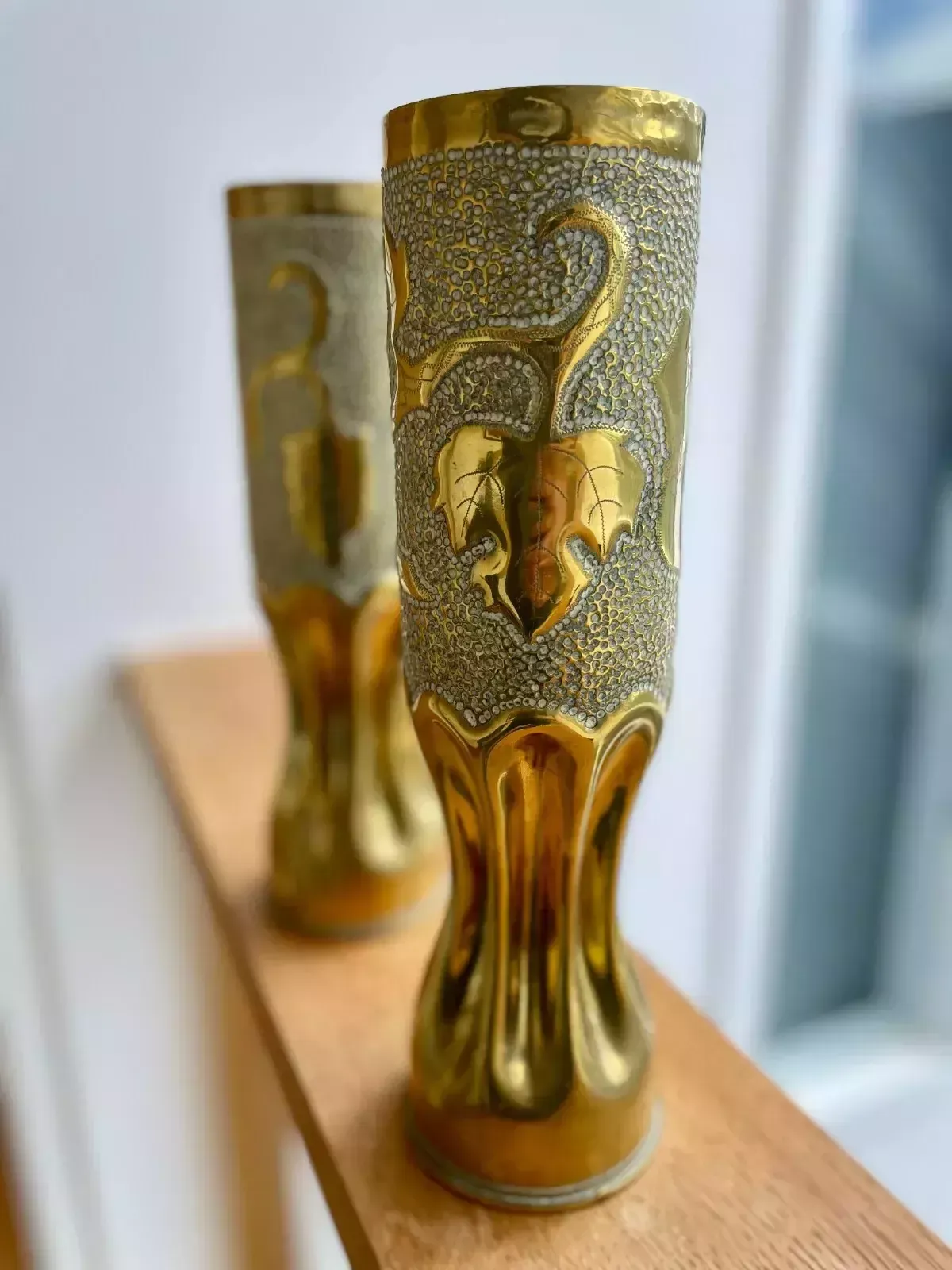 A Pair Of Brass Trench Art Vases With Vine Pattern "Souvenir De Vouziers 14 19" photo vintage
