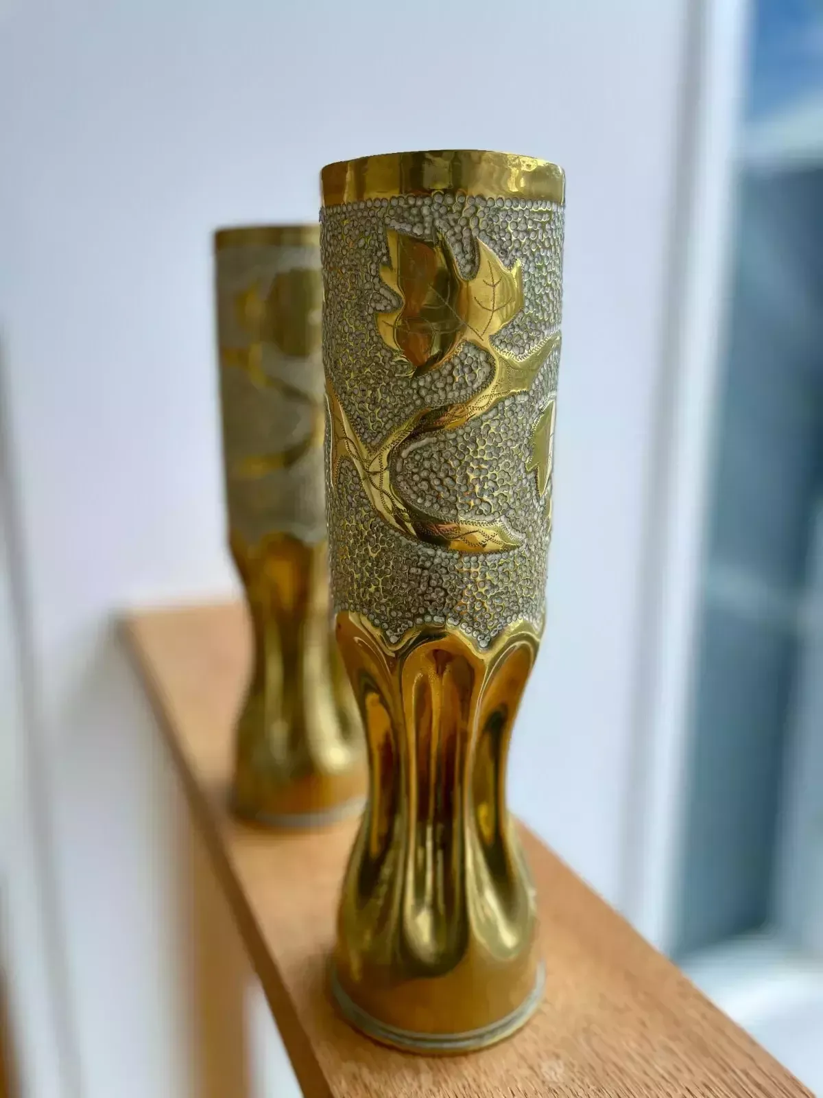 photo furniture A Pair Of Brass Trench Art Vases With Vine Pattern "Souvenir De Vouziers 14 19"