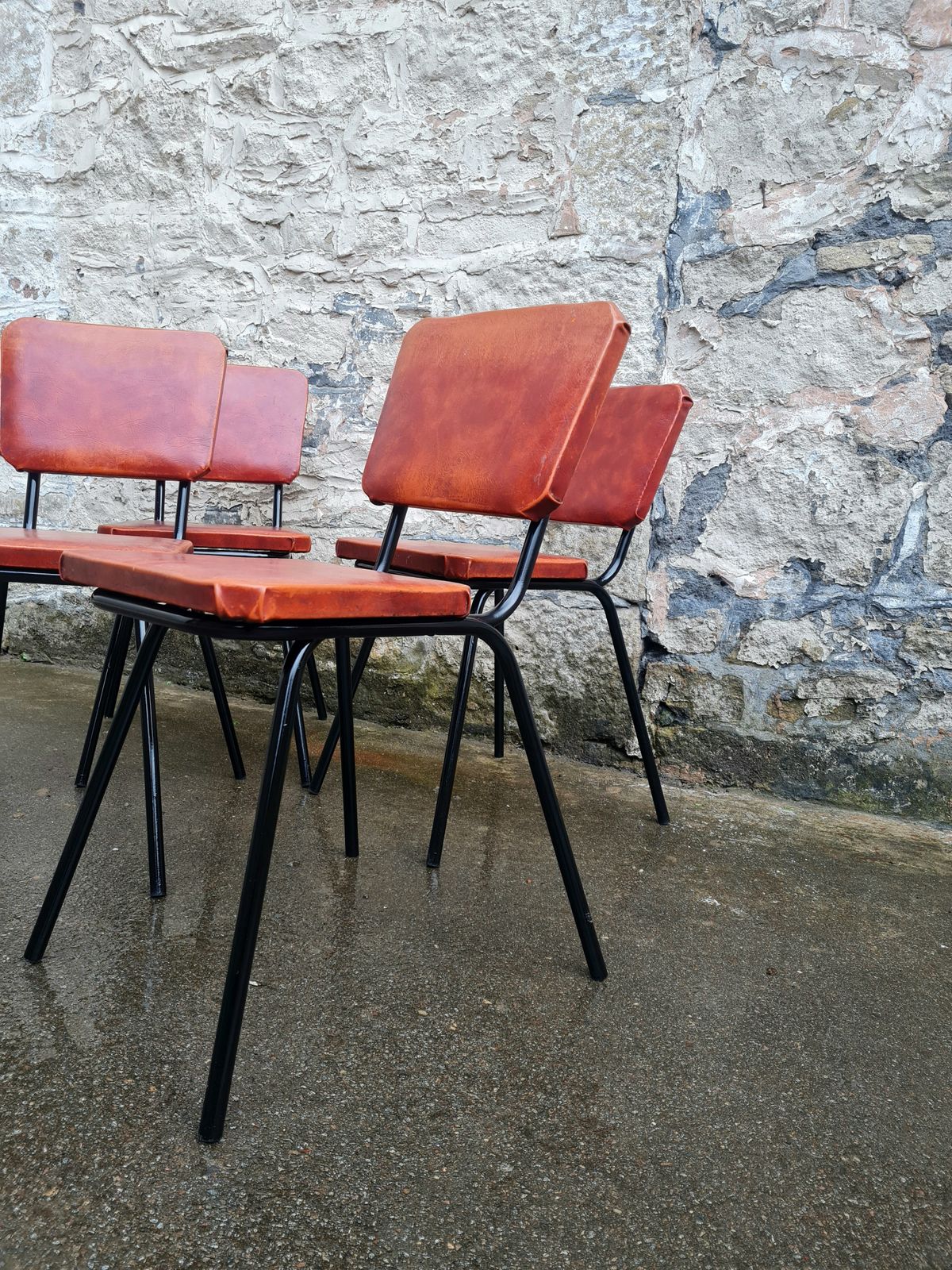 photo buy Set Of Four Mid Century Black And Orange Dining Chairs Stackable