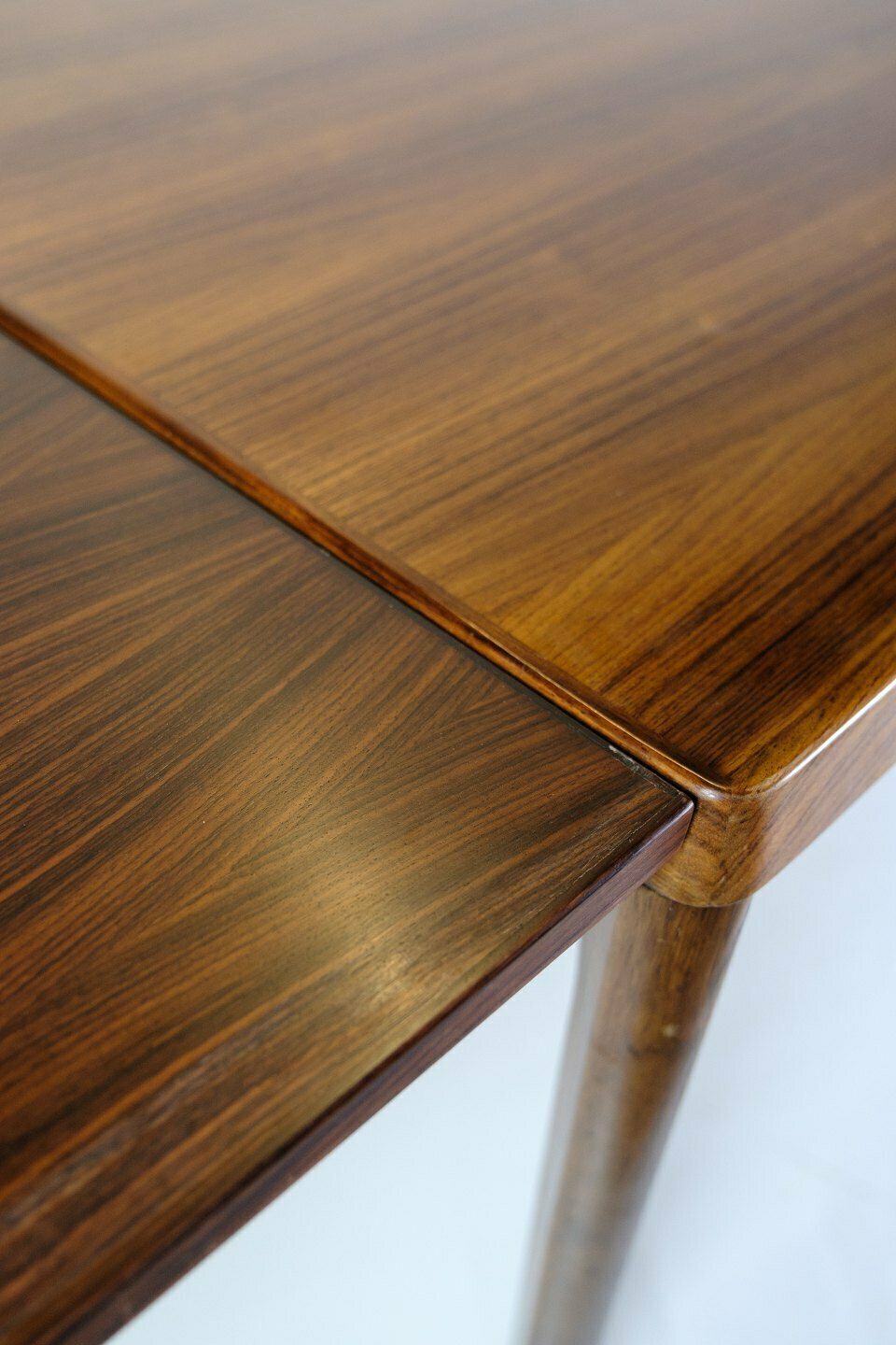 Dining Table In Rosewood With Pull Out By Henning Kjærnulf For Vejle Chairs & Furniture Factory From 1960s photo vintage
