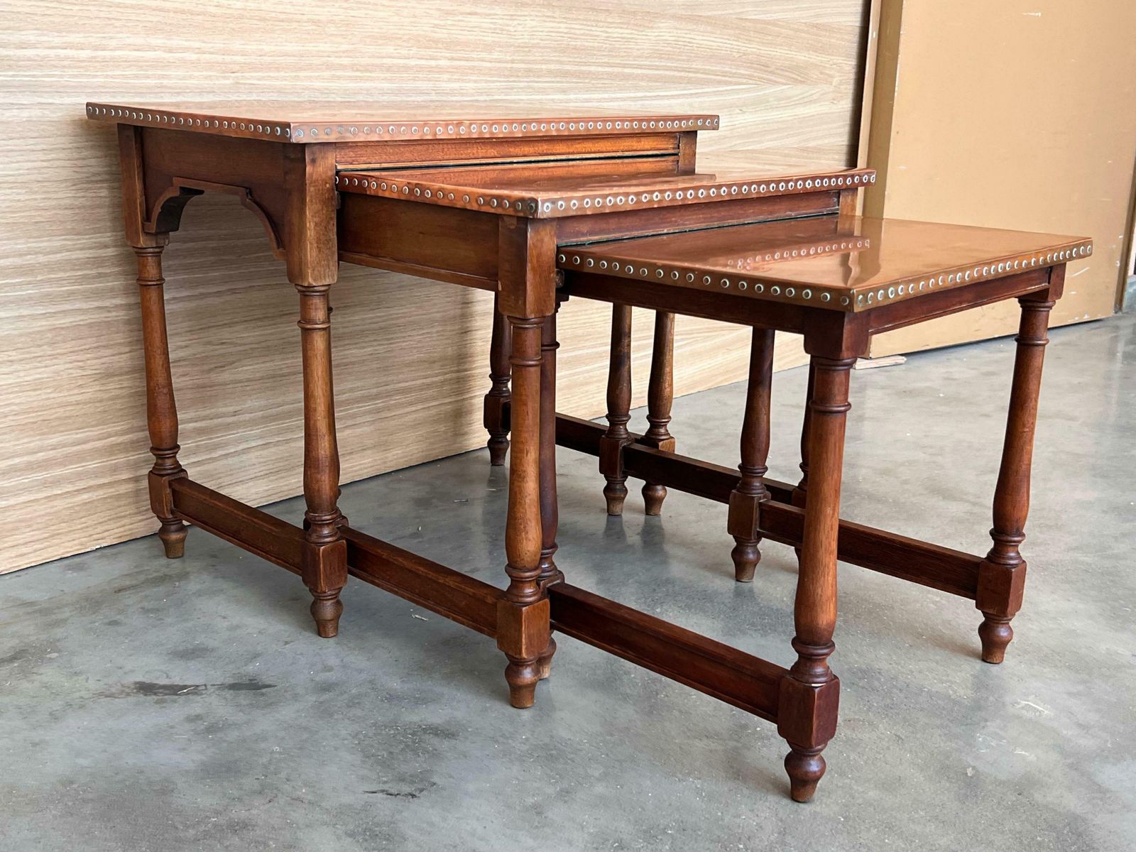 Set Of Three Spanish Walnut Nesting Tables With Copper Top photo vinterior