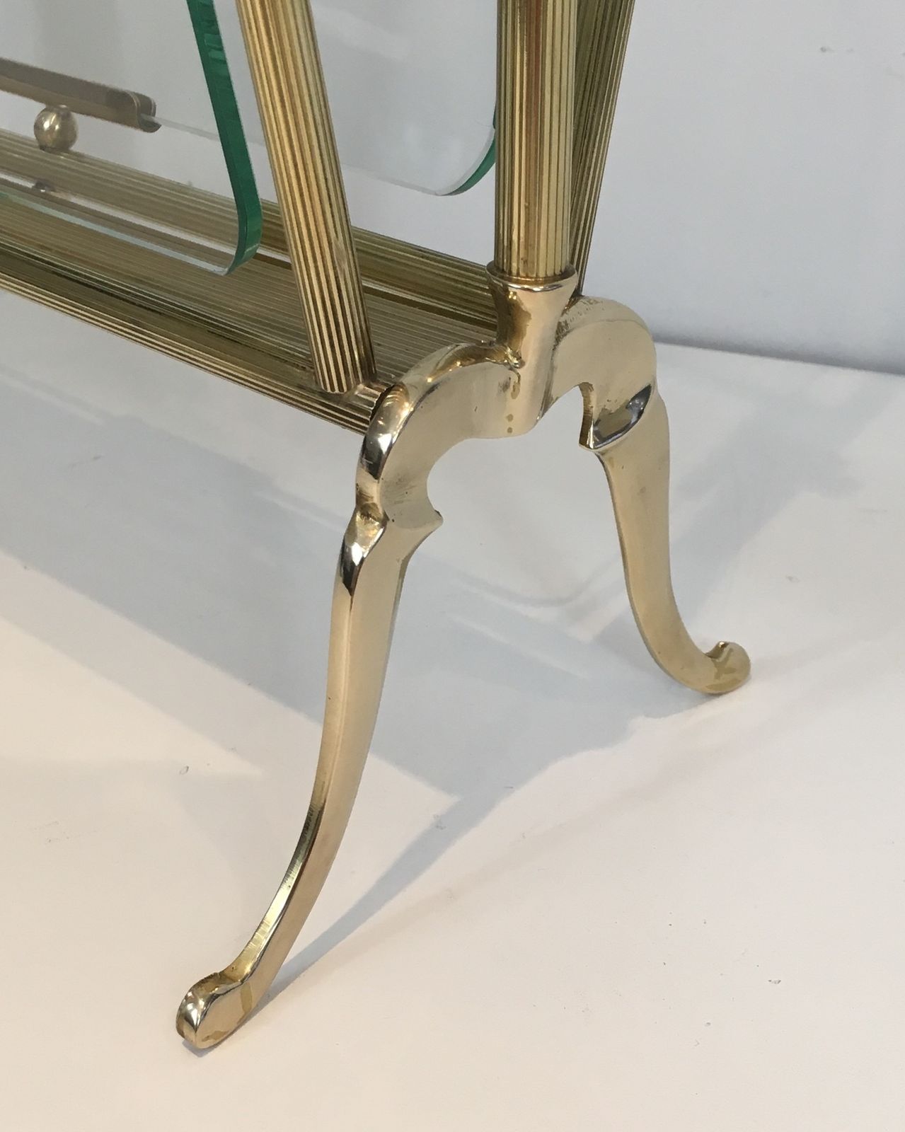 photo for sale Brass And Clear Glass Magazine Rack From Maison Jansen