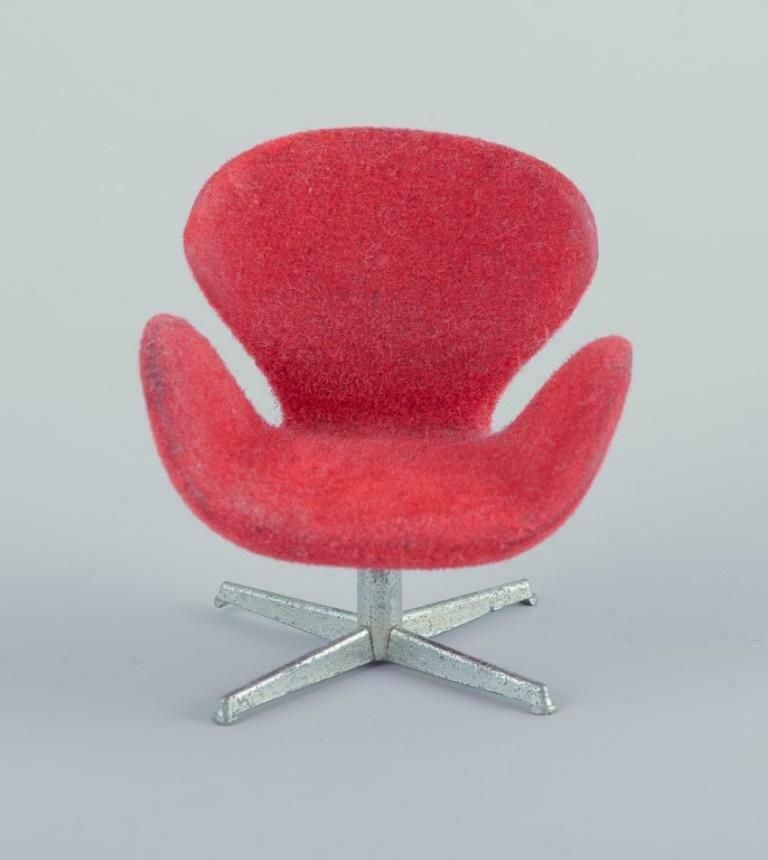 Miniatures Of The "Swan" Chair And Sofa In Red Fabric, Designed By Arne Jacobsen photo furniture