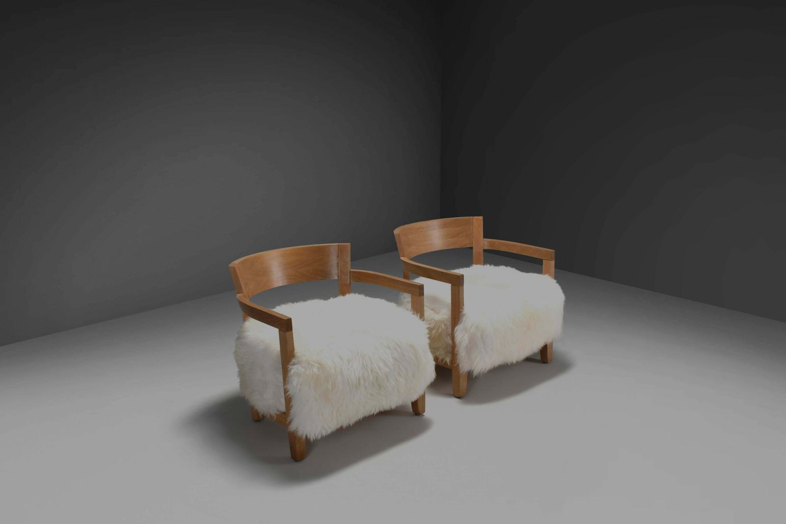 Set Of Two Solid Oak And Off White Sheepskin Chairs, Switzerland, 1970s photo for sale
