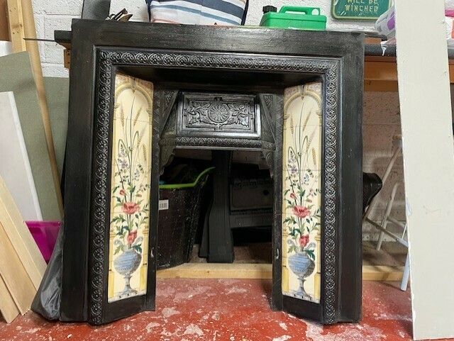 Tiled Cast Iron Fireplace Surround photo 300.0