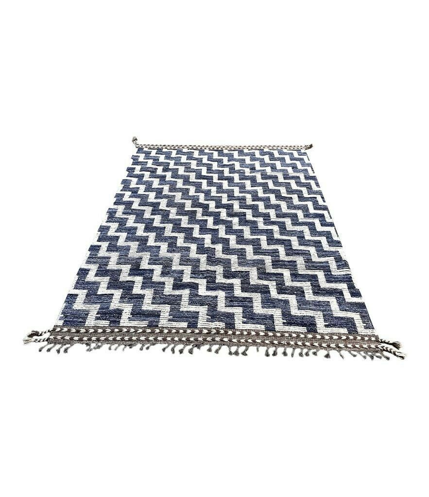 A Handmade Morrocan Beni Ourain Berber Rug With Blue And White Stepped Design. photo Textiles