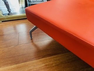 Mid Century Danish Style Long Bench. Orange Vinyl Upholstery And Stainless Steel Legs. Orangebox. photo for sale