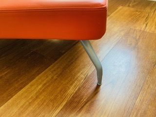 Mid Century Danish Style Long Bench. Orange Vinyl Upholstery And Stainless Steel Legs. Orangebox. photo vintage