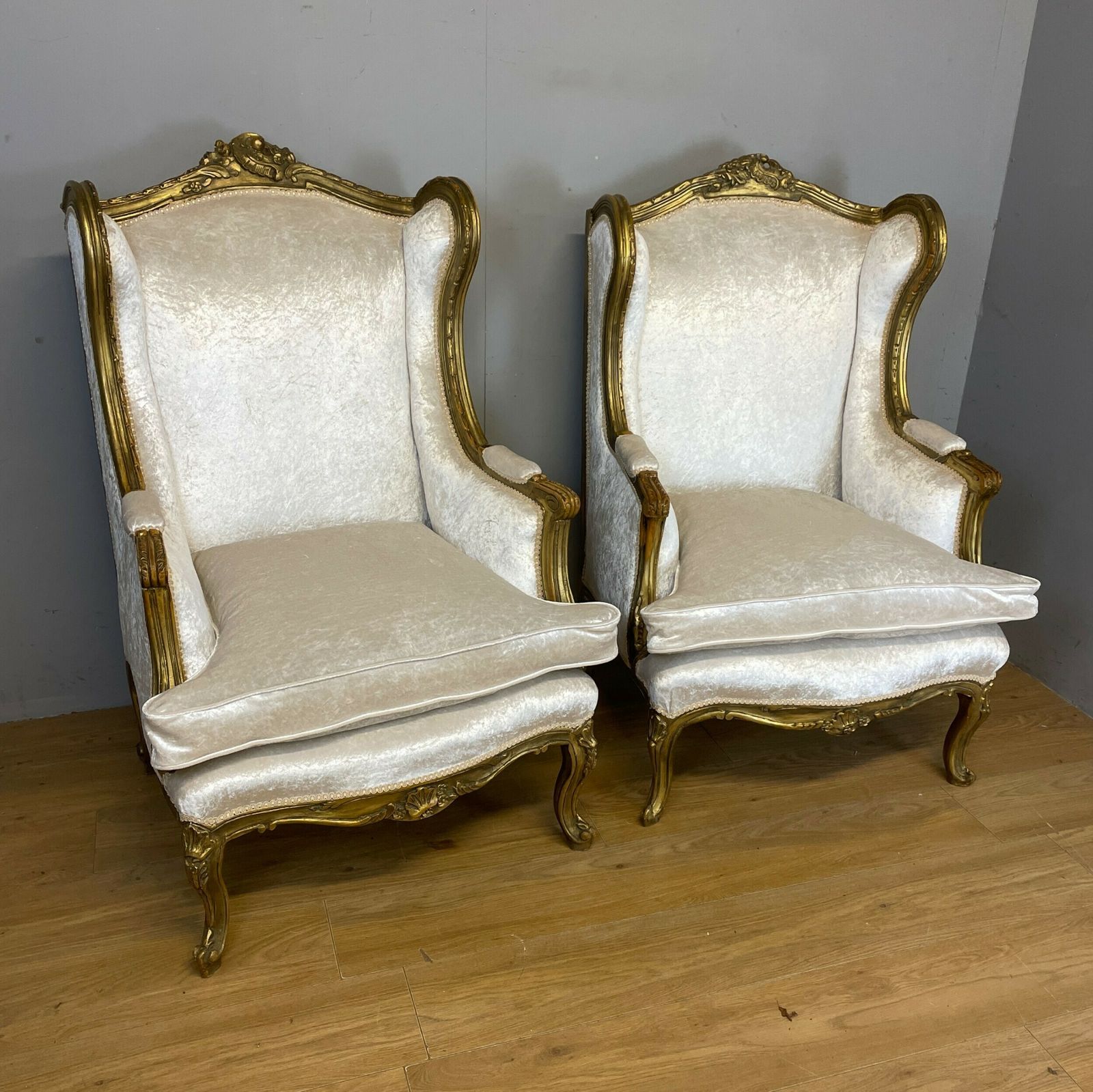 Early C20th Pair Of Carved And Gilded French Winged Armchairs photo for sale