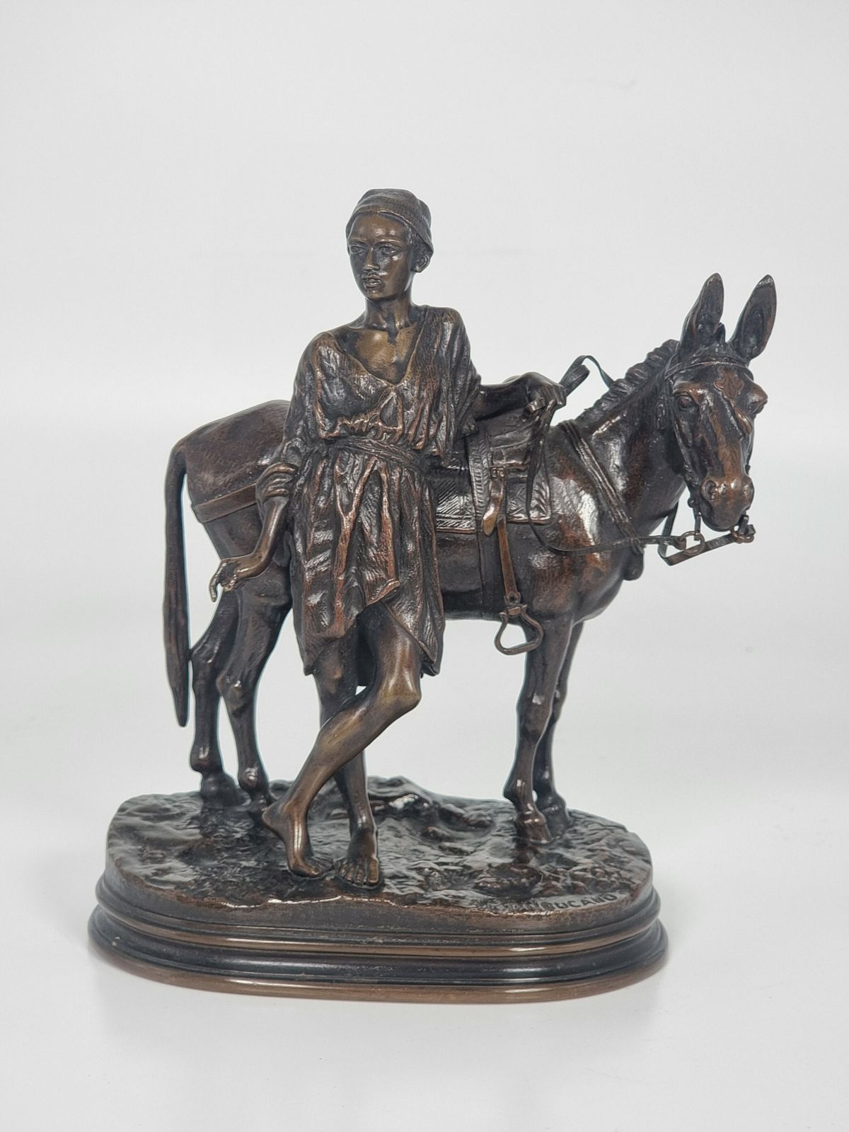 19th Century French Bronze Sculpture Depicting A Boy With His Mule By A E Dubucand Circa 1870 photo vintage
