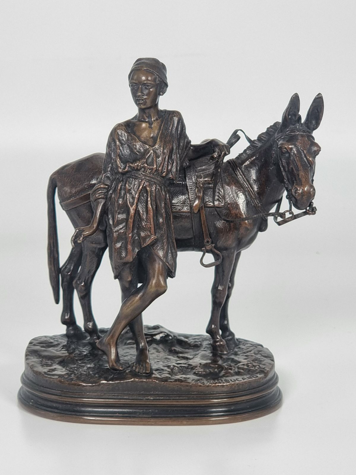 photo for sale 19th Century French Bronze Sculpture Depicting A Boy With His Mule By A E Dubucand Circa 1870