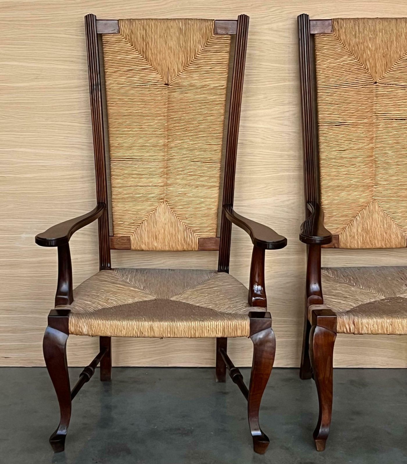 Paire de fauteuils espagnols en noyer à dossier et assise cannés, XXe siècle photo for sale