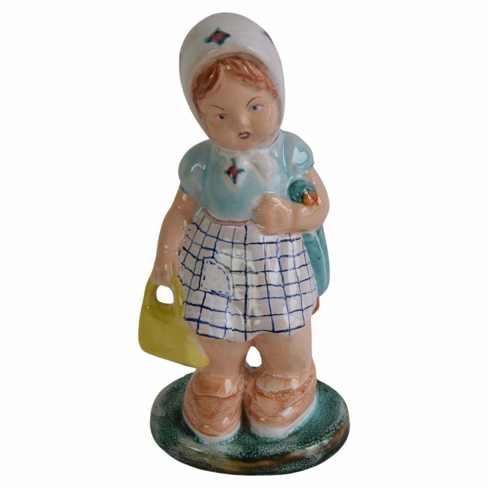 Art Deco Ceramic Figurine Of A Girl With A Handbag, Circa 1940