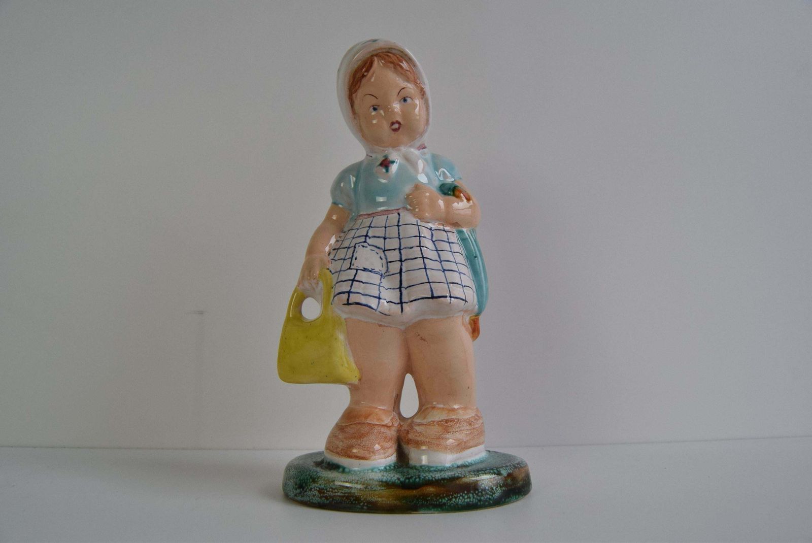 Art Deco Ceramic Figurine Of A Girl With A Handbag, Circa 1940 photo for sale