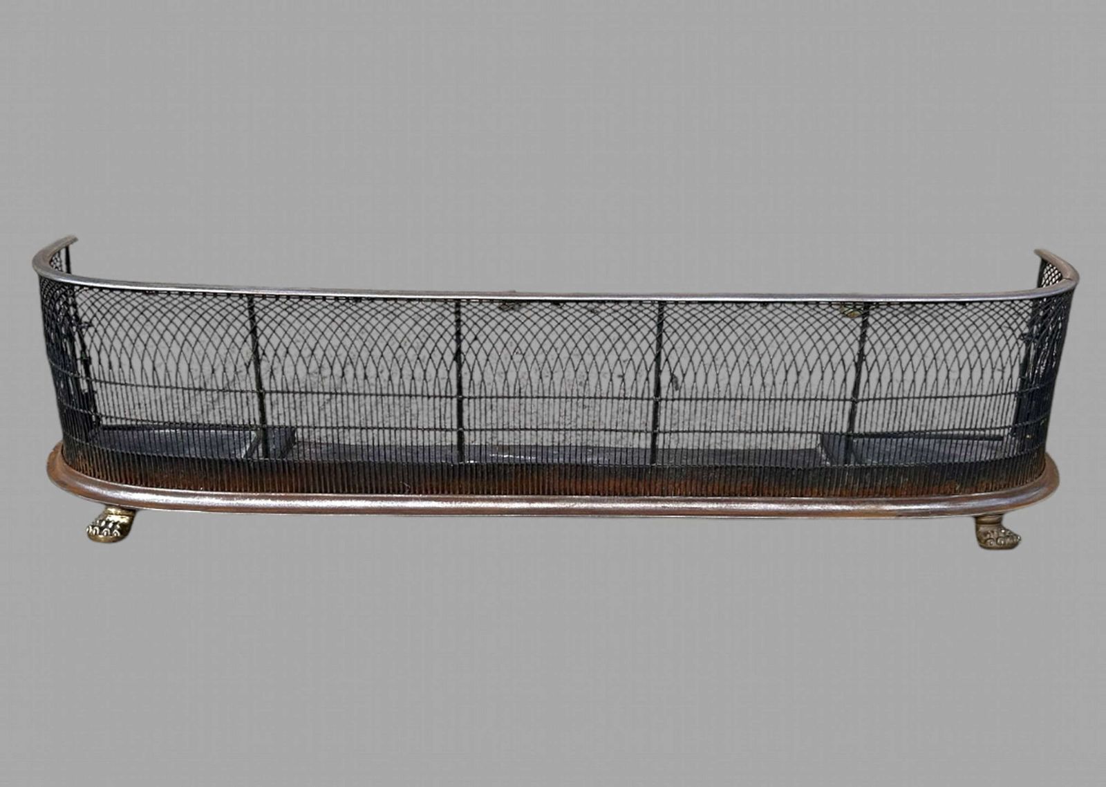 A Steel And Brass Fender