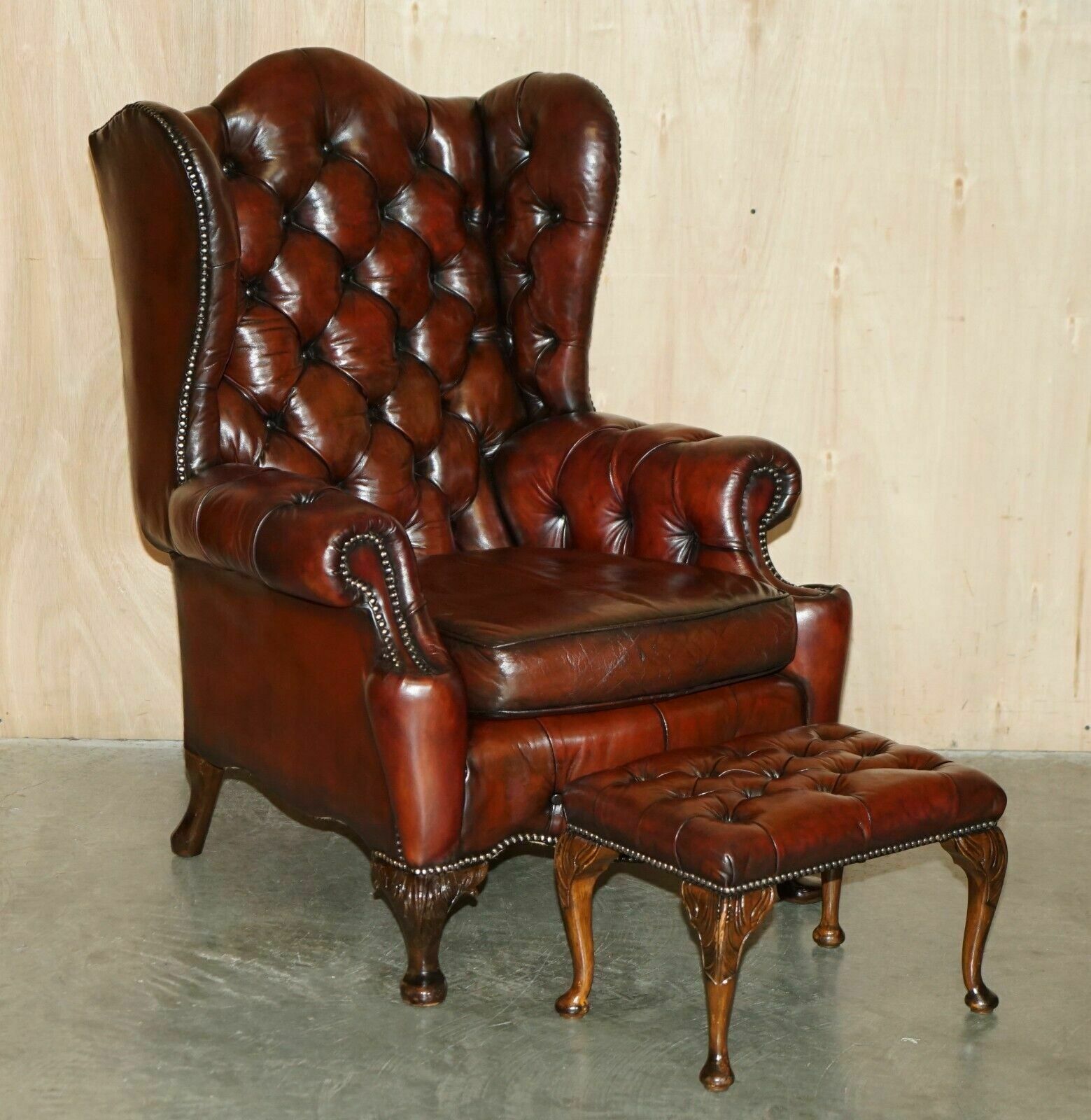 Pair Of Chesterfield Vintage Oxblood Leather Wingback Armchairs & Footstools photo furniture