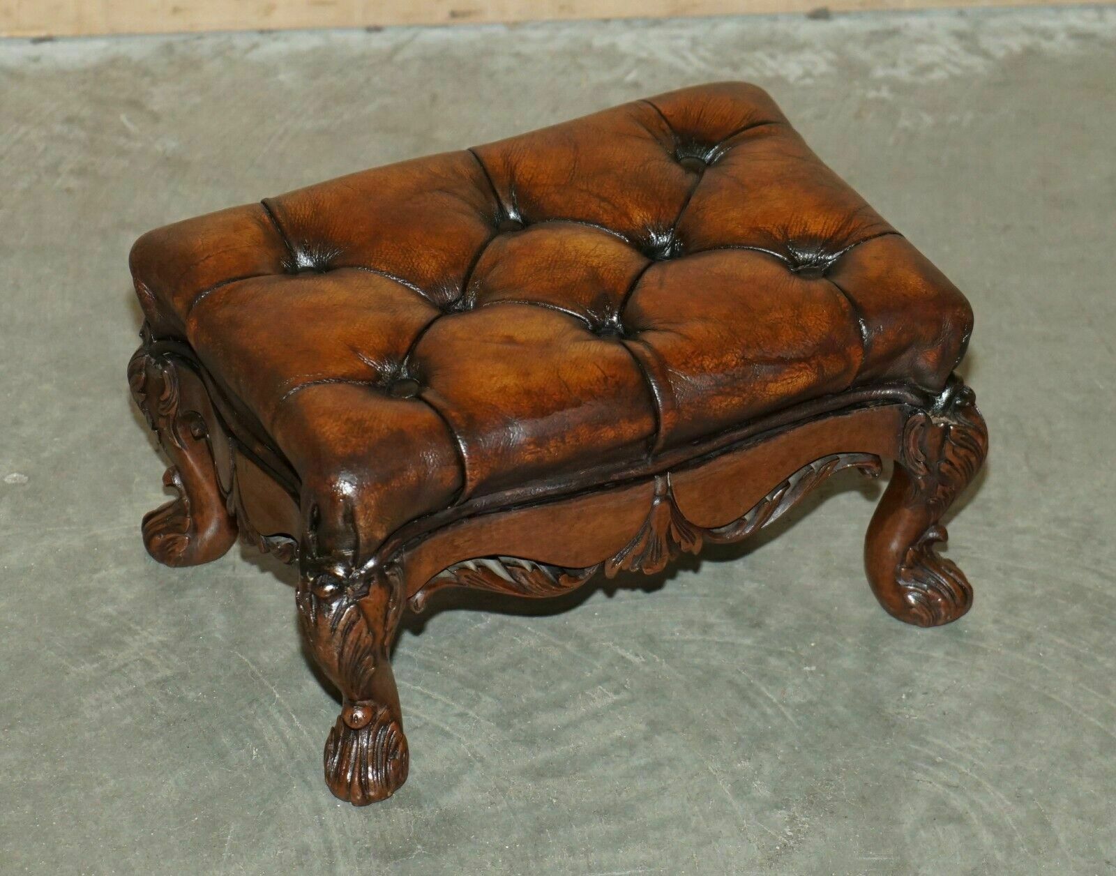 Fine Pair Of Ornate Hand Carved Victorian Brown Leather Chesterfield Footstools photo for sale