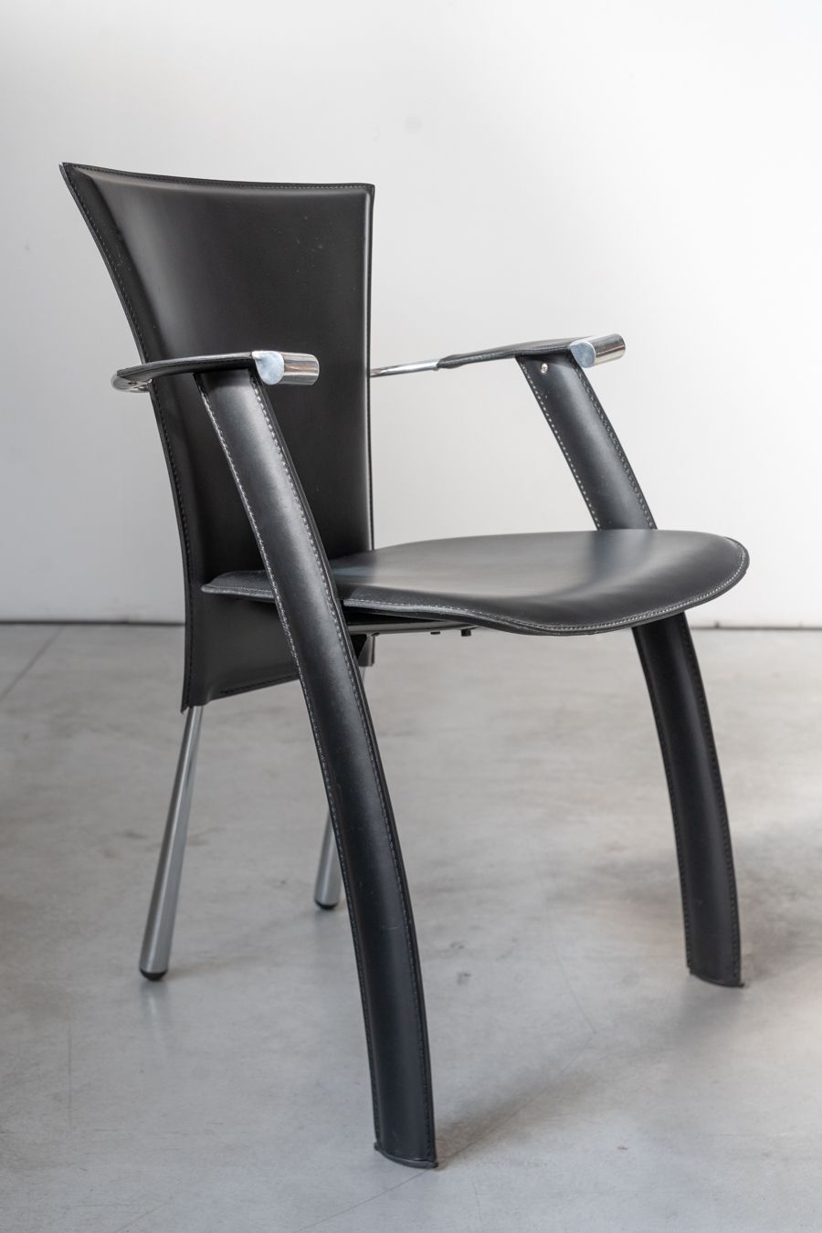 Stine Line 1990s Leather Armchair – Sleek Black Italian Design With Modern Flair photo furniture