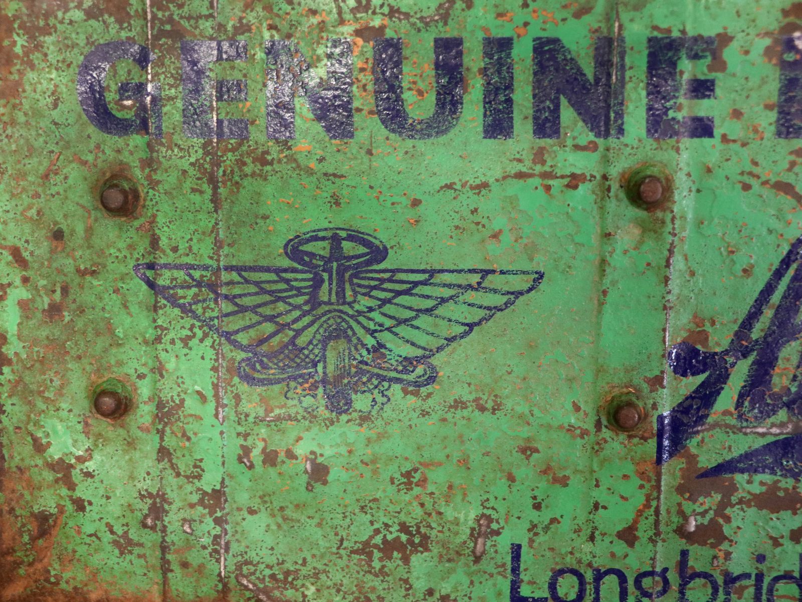A Lovely Vintage Metal Trunk That Has Been Hand Sign Written With The Emblem For Austin Cars. photo vintage