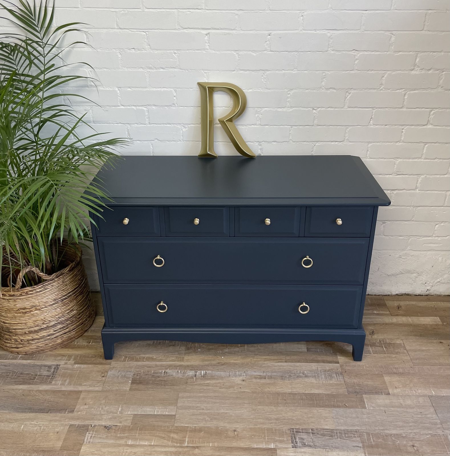 photo buy Stag Minstrel 4 Over 2 Wide Chest Of Drawers Painted Midnight Ink