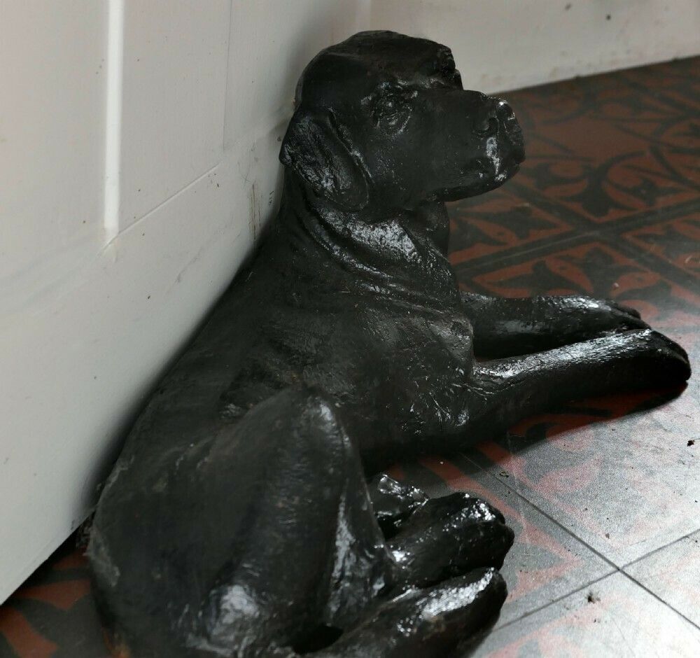 A Black Labrador Puppy, Door Stop photo vinterior