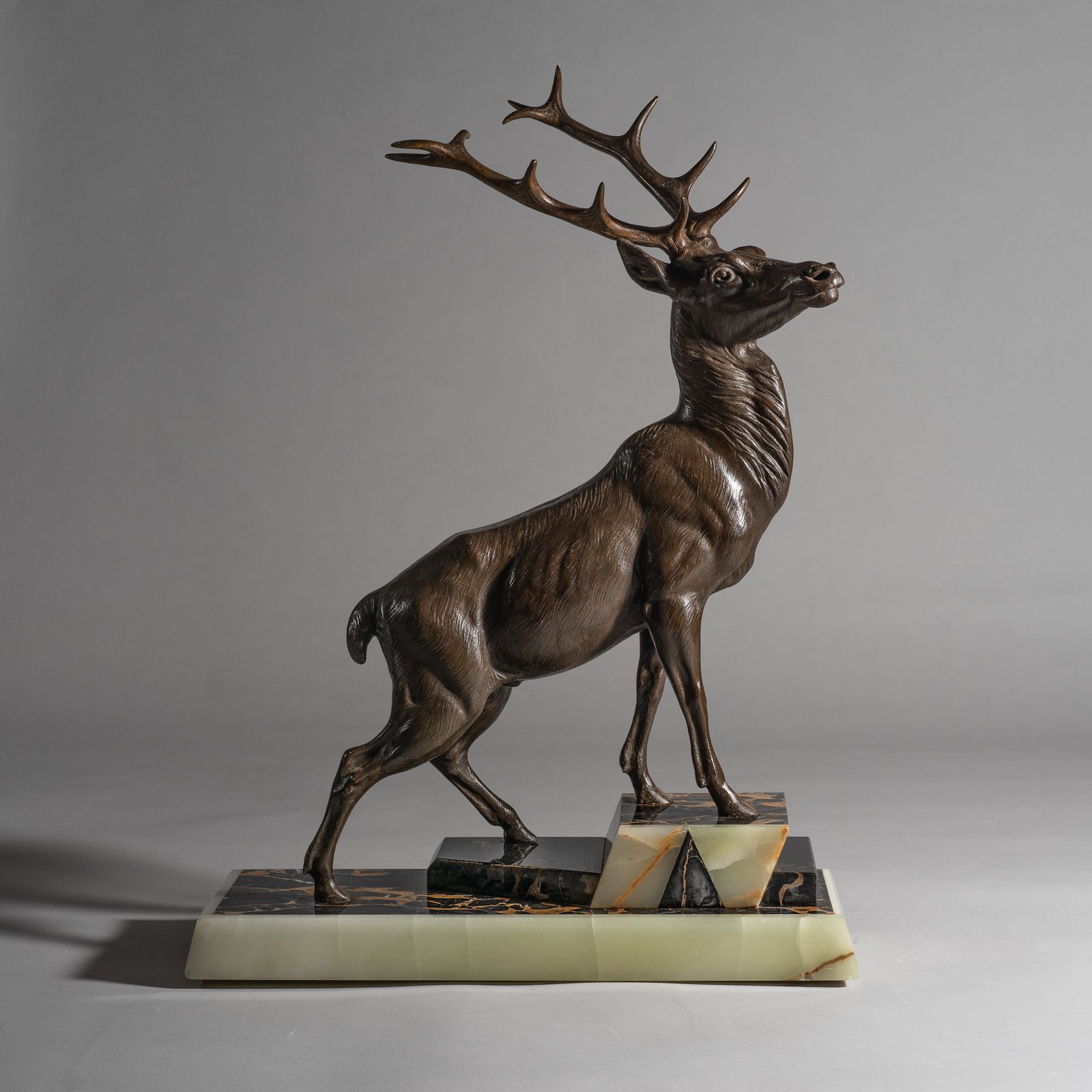 Large French Art Deco Sculpture Of A Stag Set On A Marble And Onyx Base