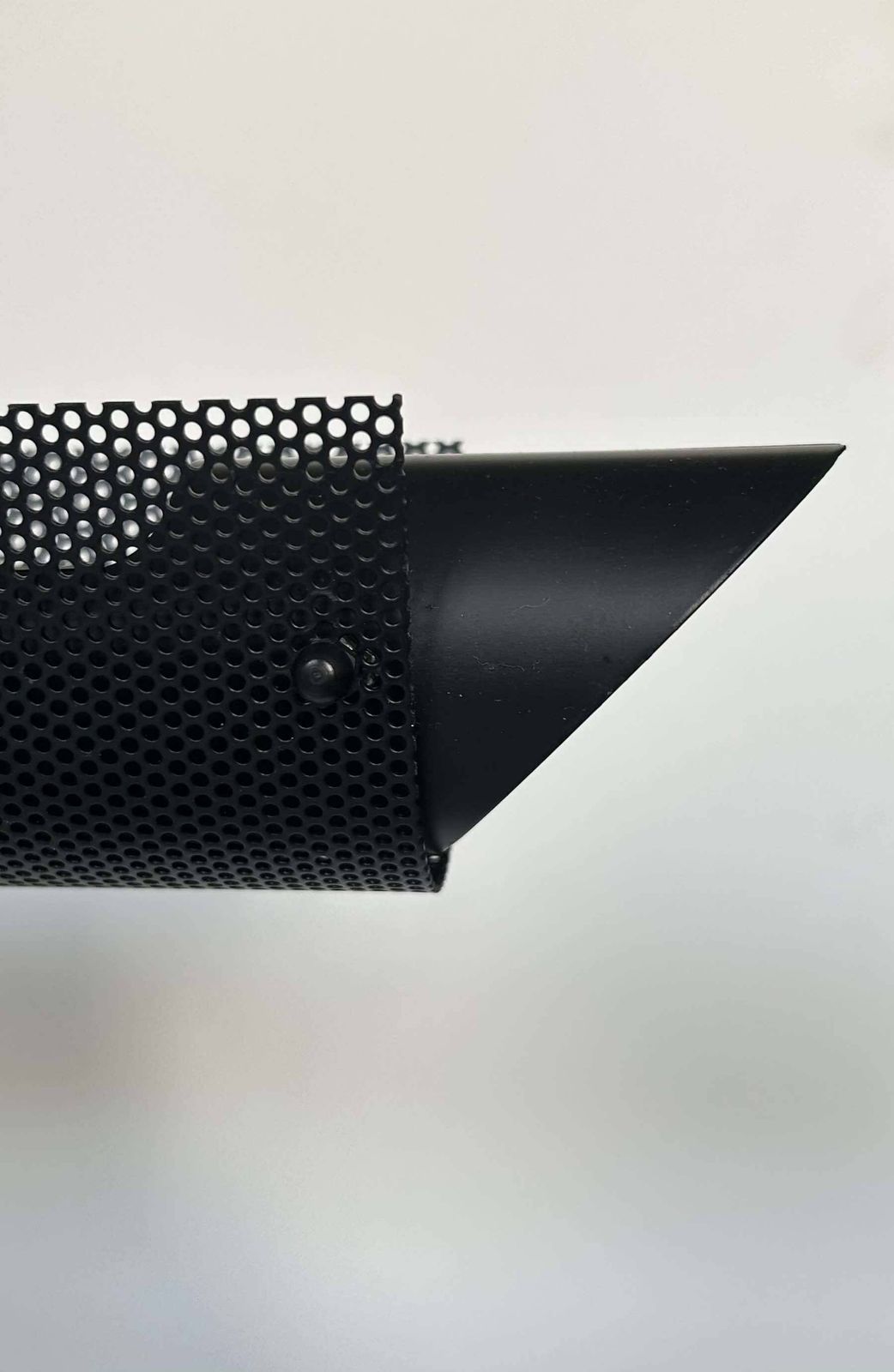 photo furniture Pair Of Black Tubular And Perforated Metal Wall Lights By Parscot, France 1980