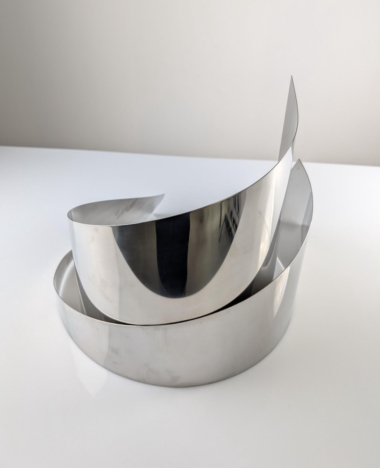 Steel Sculpture “Silver Wind” Vertical By Joaquin Torres & Rafael Llamazares photo Art
