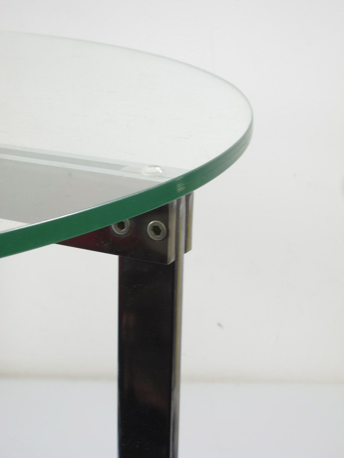 photo furniture Modernistische Salontafel – Roestvrij Staal & Glas