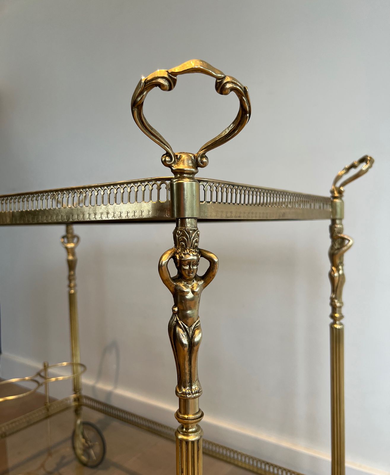 photo vintage Neoclassical Style Brass Trolley With Cherub Decor In The Style Of Maison Jansen