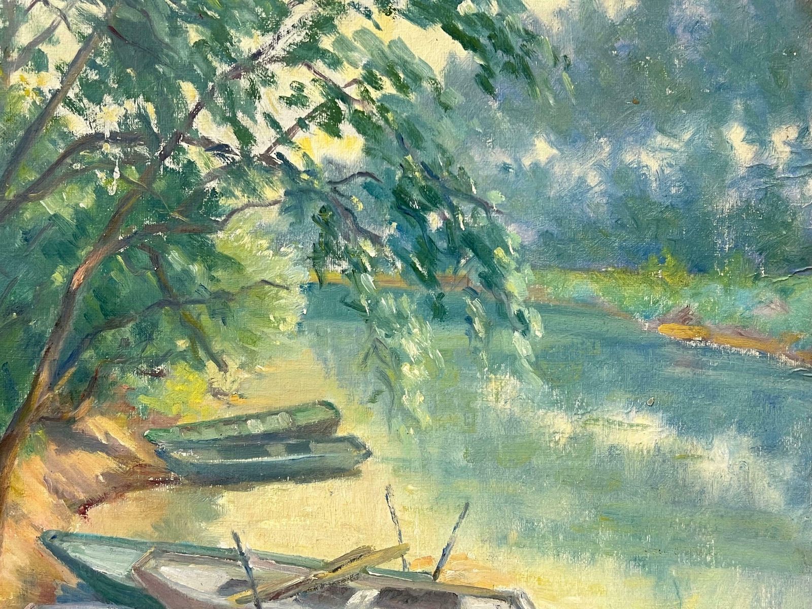 Regine Davidresting Rowboats By A Shaded Riverbank A Tranquil Waterway Scene With Lush Trees1950's photo vinterior
