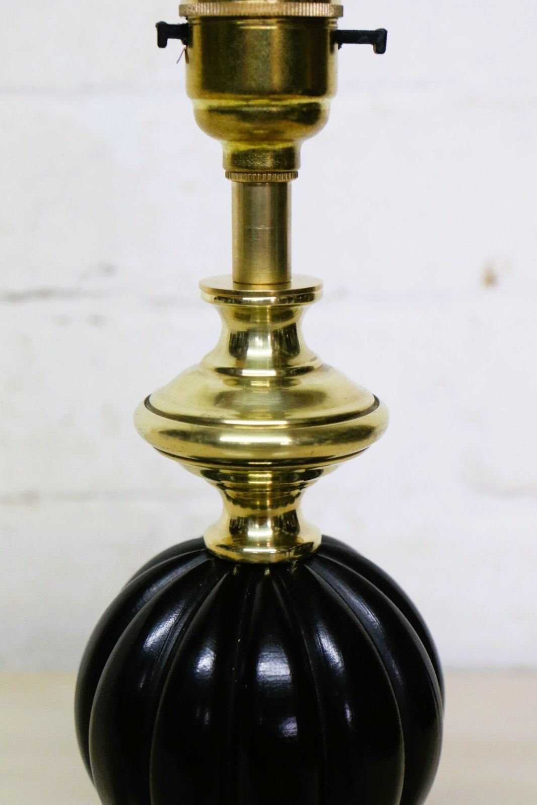 Table Lamp A Small Vintage Black Wooden Lamp In The Style Of A Victorian Lamp photo for sale