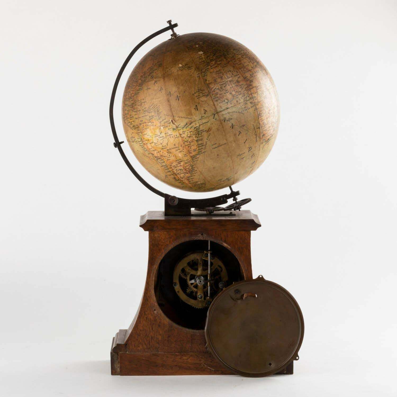 19th Century Clock Surmounted By A Globe, Napoleon III Period. photo for sale