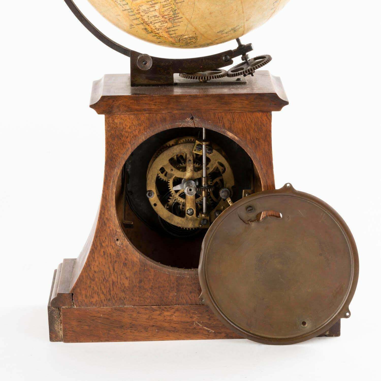 3582.0 19th Century Clock Surmounted By A Globe, Napoleon III Period. photo