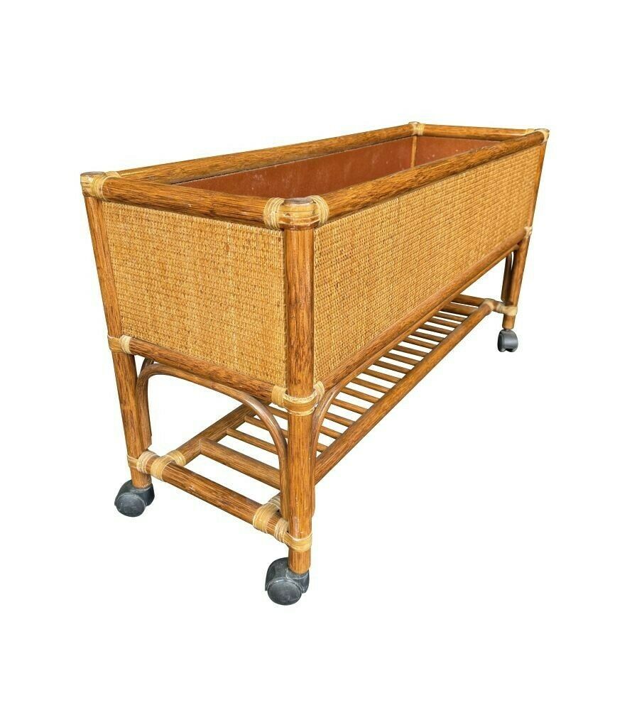 A Pair Of Italian 1970s Bamboo And Rattan Planters On Castors photo for sale