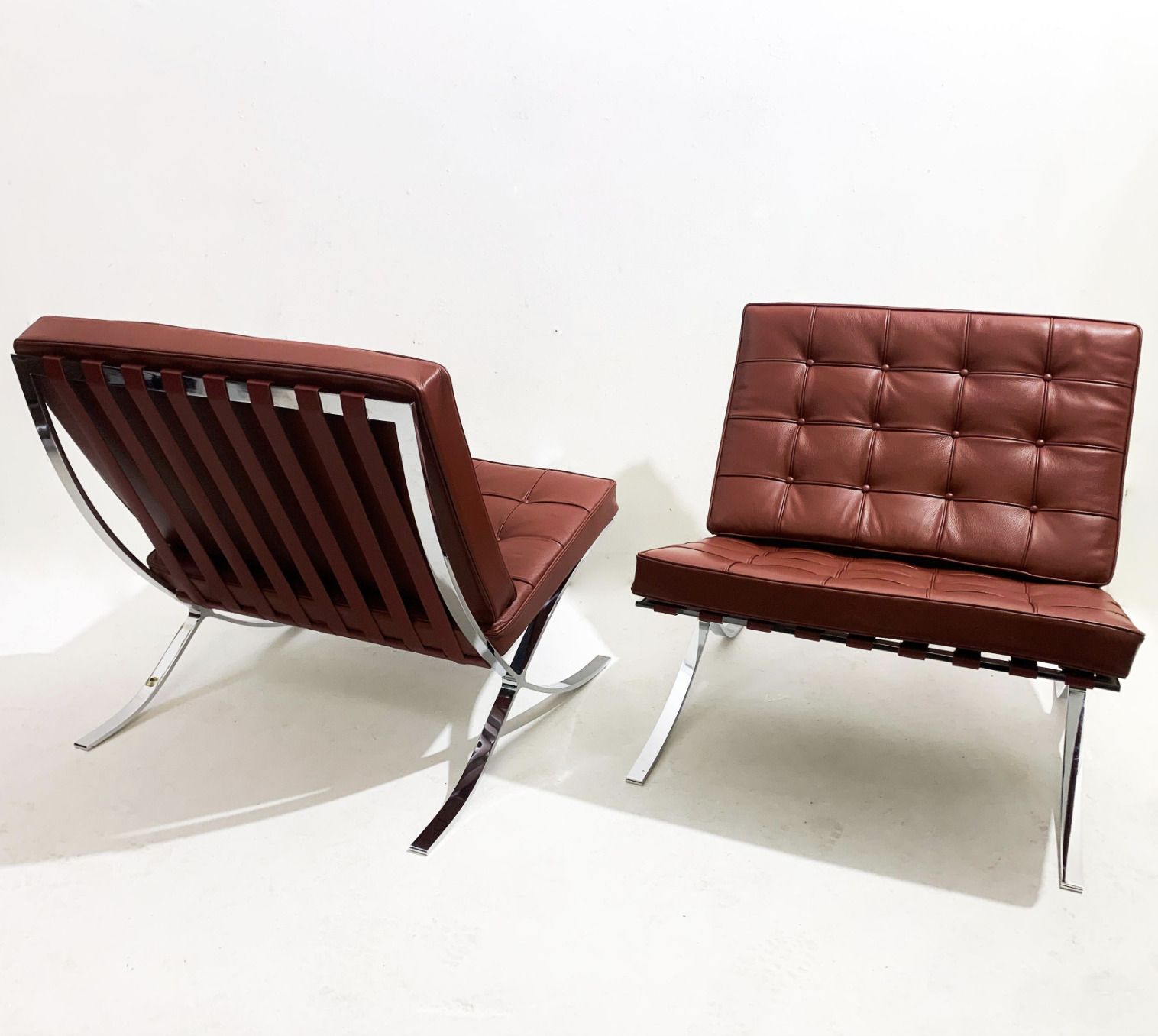 Pair Of Burgundy Leather Barcelona Chairs By Mies Van Der Rohe For Knoll, 1990s photo vintage