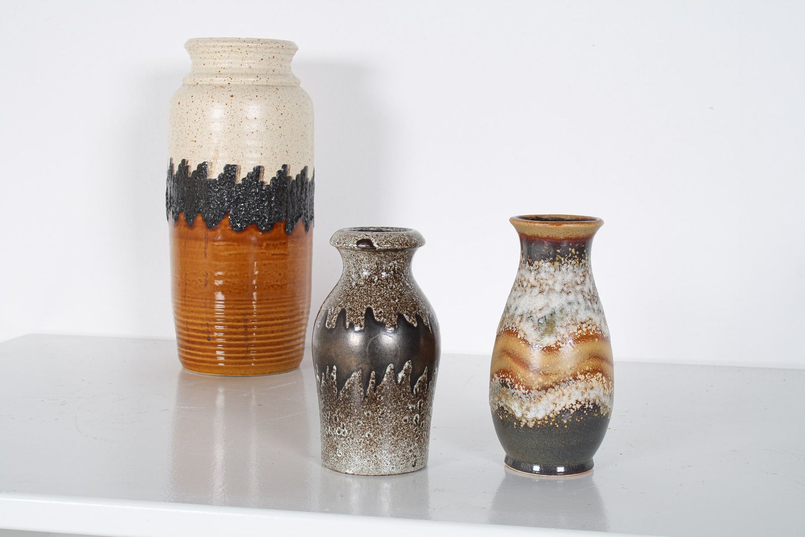 A Pair Of West German Pottery Lava Vases In Earthy Vibrant Tones photo furniture